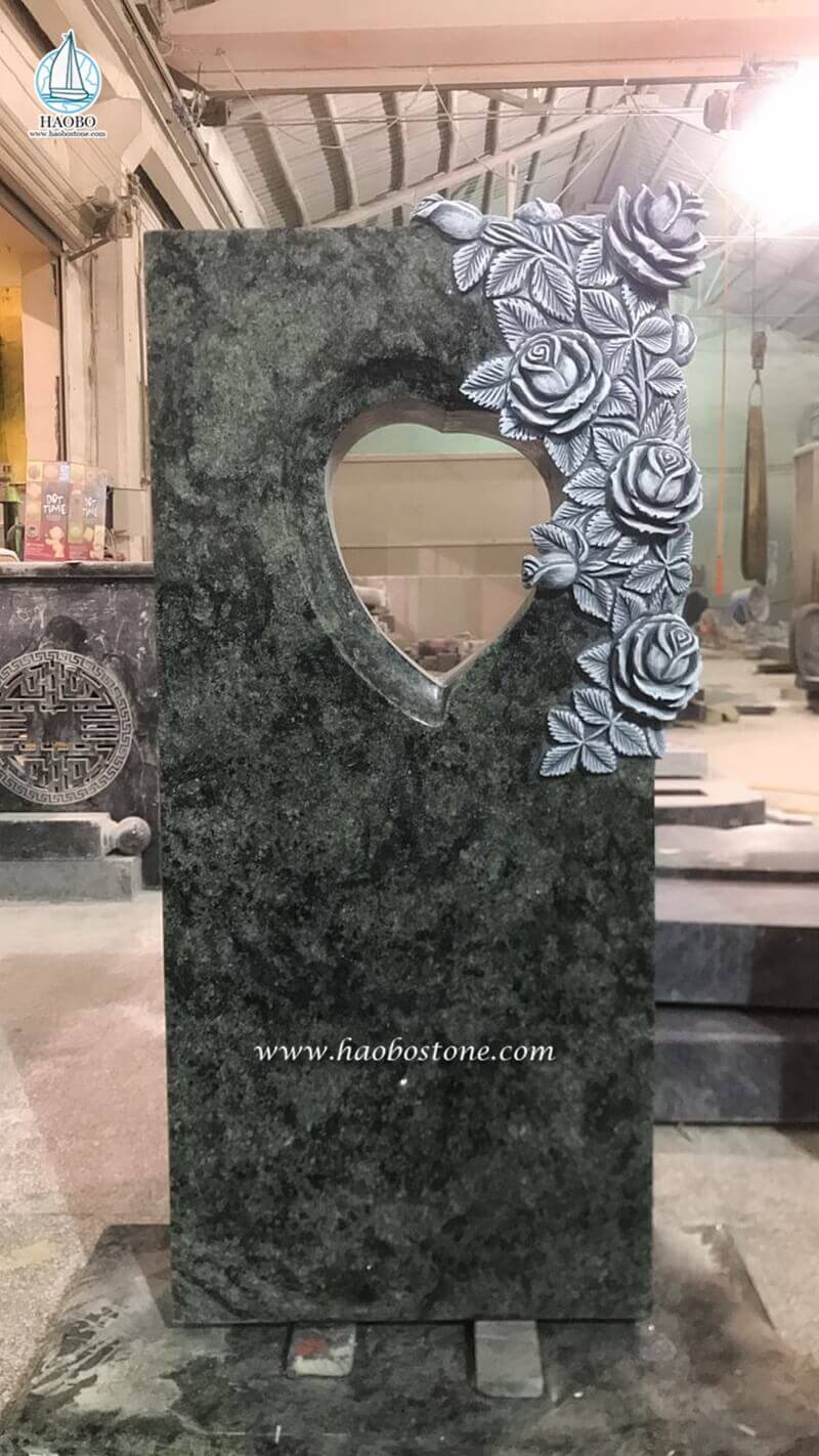 green granite flower carved