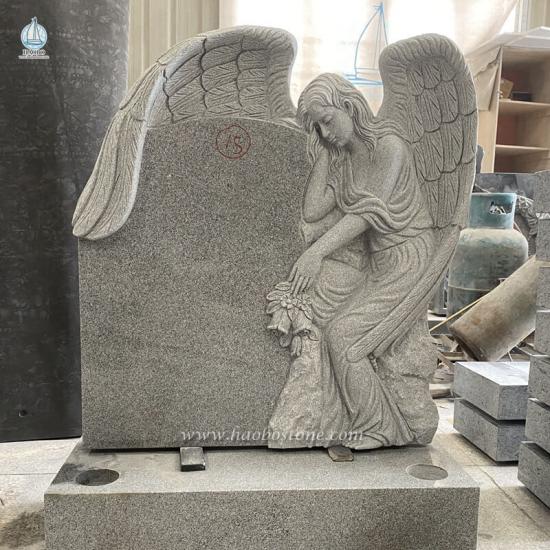Angel Holding Floral Carved Monument