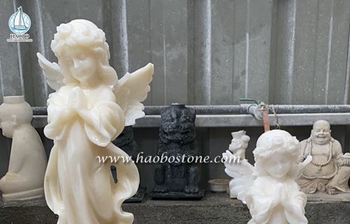 sculpture d'ange en marbre blanc sur pierre haobo